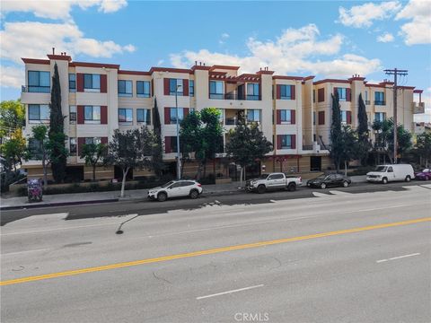 Photo of 6938 Laurel Canyon Boulevard #303, North Hollywood, CA 91605 (MLS # OC26070591)