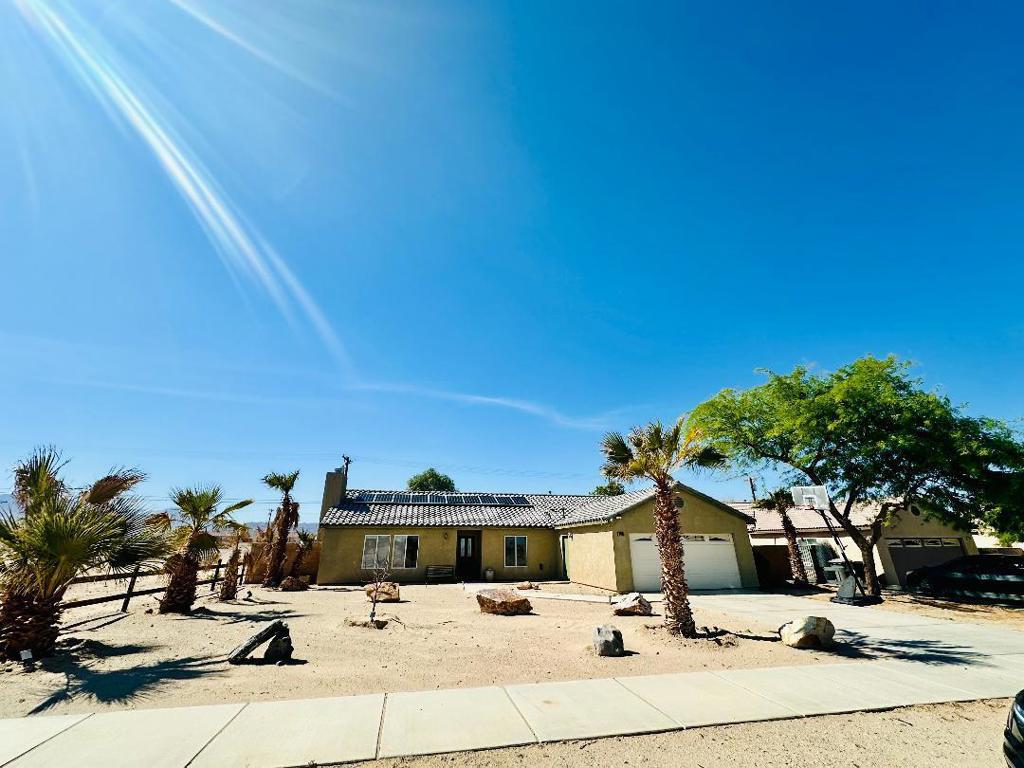 This home has 3 bedrooms, 2 full baths, great room floor plan with a fireplace. Spacious island kitchen, newer tile flooring, owned solar for lower electric bills!! All located on a large lot.