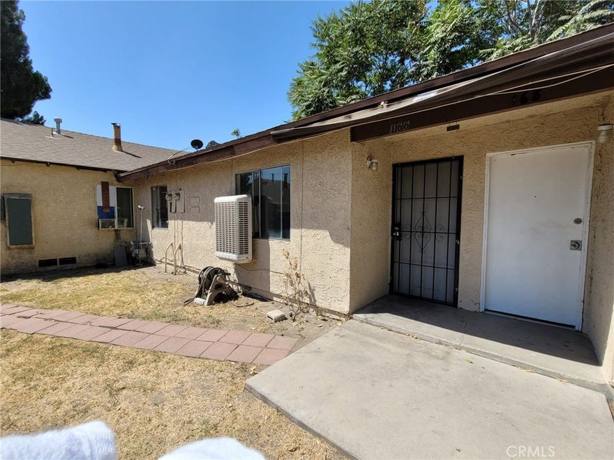 Warm and Cozy 2 bedroom 1 bath unit.  Remodeled Kitchen with Stainless Steel Stove and Microwave, New Interior Paint throughout the unit, New vinyl tile floors in the bedrooms, New Shower/tub in bathroom installed 1 year ago. This unit has central air and window swamp cooler. The unit also comes with 1 covered carport space for parking. This end unit is located near shops and restaurants, minutes away from the 215, 210 and 10 freeways Don't miss out seeing this unit it wouldn't be on the market long.