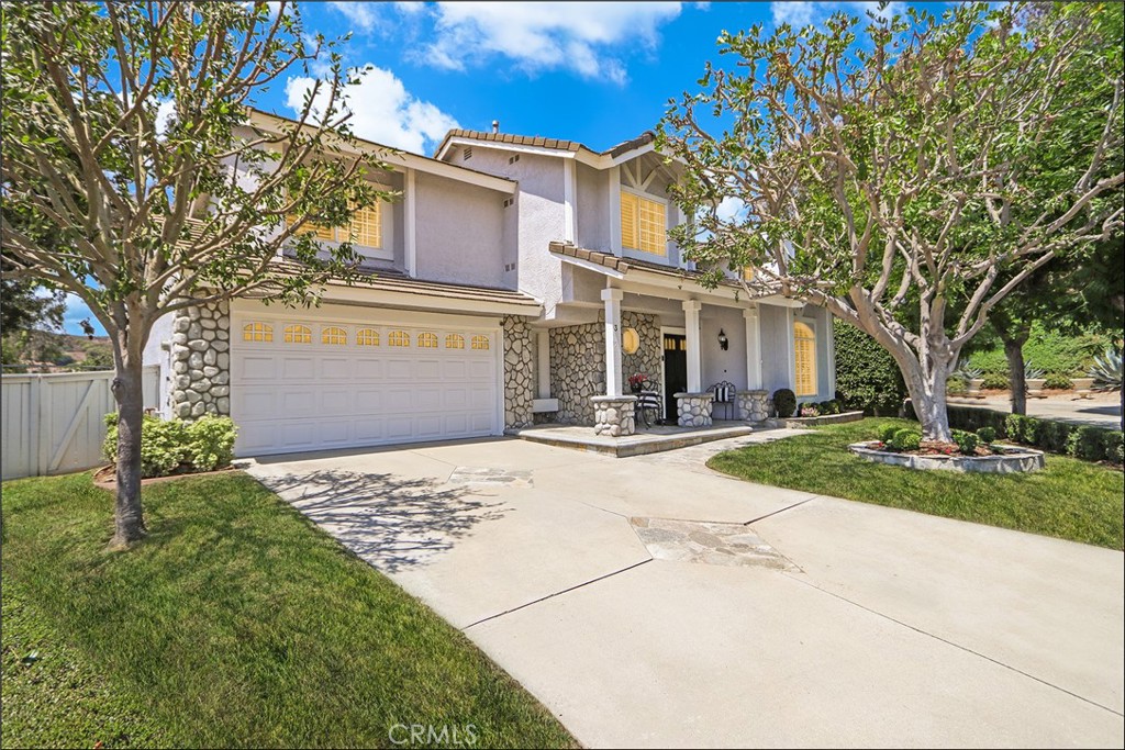 SPECTACULAR END OF CUL-DE-SAC LOCATION AND LARGE YARD WITH STUNNING SUNSET VIEWS AND COOL OCEAN BREEZES! ONCE IN A LIFETIME OPPORTUNITY TO ACQUIRE A TRULY AMAZING PROPERTY WITH A HIGHLY SOUGHT AFTER LOCATION! 10+ Curb appeal with long stone accented driveway and picture perfect front yard with mature trees, tastefully landscaped, and large front covered porch. Open and airy floor plan offering a large foyer with designer chandelier, living and dining room with fireplace and two story ceilings, separate family room with French doors leading to the inviting backyard and opens to the delightful kitchen with large windows overlooking the amazing yard. Upgraded flooring and baseboards, fresh white interior paint, custom plantation shutters, upgraded HVAC, designer lighting fixtures and chandeliers. Second story features a spacious master suite with vaulted ceilings and windows on both sides to enjoy the cool ocean breezes and upgraded master bathroom featuring a large vanity with designer Quartz countertop, dual sinks and upgraded fixtures. 2nd and 3rd bedroom and full hall bathroom with upgraded vanity, Quartz countertop and upgraded fixtures. Main floor also features a powder room and direct access to the two car garage. Pie shaped lot offers a spectacular backyard with large grass area, mature trees, generous side yards on both sides, large covered patio area and stunning sunset views for your outdoor enjoyment and entertainment. This amazing property is part of the Laguna Beach School District and offers easy toll road (73) and beach access (via 133), excellent proximity to Aliso Viejo Town Center with shops, restaurants and entertainment and nearby hiking, biking and nature trails! BRAND NEW PATIO COVER INSTALLED!