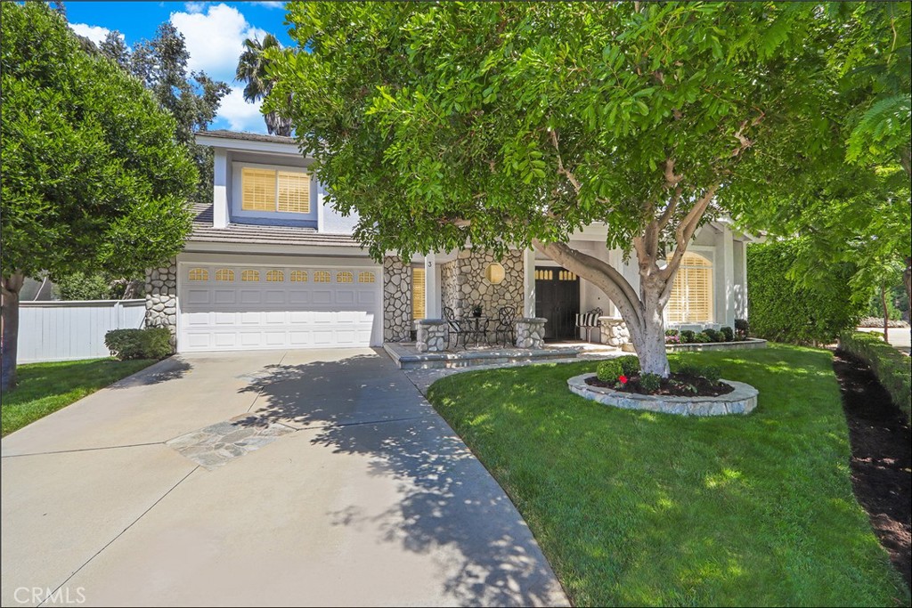 SPECTACULAR END OF CUL-DE-SAC LOCATION AND LARGE YARD WITH STUNNING SUNSET VIEWS AND COOL OCEAN BREEZES! ONCE IN A LIFETIME OPPORTUNITY TO ACQUIRE A TRULY AMAZING PROPERTY WITH A HIGHLY SOUGHT AFTER LOCATION! 10+ Curb appeal with long stone accented driveway and picture perfect front yard with mature trees, tastefully landscaped, and large front covered porch. Open and airy floor plan offering a large foyer with designer chandelier, living and dining room with fireplace and two story ceilings, separate family room with French doors leading to the inviting backyard and opens to the delightful kitchen with large windows overlooking the amazing yard. Upgraded flooring and baseboards, fresh white interior paint, custom plantation shutters, upgraded HVAC, designer lighting fixtures and chandeliers. Second story features a spacious master suite with vaulted ceilings and windows on both sides to enjoy the cool ocean breezes and upgraded master bathroom featuring a large vanity with designer Quartz countertop, dual sinks and upgraded fixtures. 2nd and 3rd bedroom and full hall bathroom with upgraded vanity, Quartz countertop and upgraded fixtures. Main floor also features a powder room and direct access to the two car garage. Pie shaped lot offers a spectacular backyard with large grass area, mature trees, generous side yards on both sides, large covered patio area and stunning sunset views for your outdoor enjoyment and entertainment. This amazing property is part of the Laguna Beach School District and offers easy toll road (73) and beach access (via 133), excellent proximity to Aliso Viejo Town Center with shops, restaurants and entertainment and nearby hiking, biking and nature trails! BRAND NEW PATIO COVER INSTALLED!