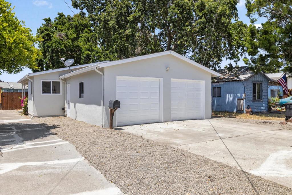 Welcome to this beautifully renovated 3-bedroom, 1.5 bathroom home in the heart of Redwood City. Thoughtfully updated with modern finishes while preserving its original charm, this 1,010 square foot residence offers a perfect blend of comfort, style, and convenience. Step inside to discover a bright and inviting interior, featuring new engineered hardwood flooring, fresh paint, updated lighting, and a completely remodeled kitchen and bathroom. The open living and dining area flows seamlessly, creating a welcoming space ideal for both relaxing and entertaining. Situated on a 4,500 square foot lot, the home offers a private backyard with plenty of space for outdoor dining, gardening, or future expansion. The manicured front yard and refreshed curb appeal make a great first impression, while the quiet, established neighborhood provides a sense of community and tranquility. Located just minutes from vibrant downtown Redwood City, major tech campuses, Caltrain, and commuter routes, this move-in-ready home is perfectly positioned for both convenience and lifestyle. Whether you're looking for your first home or a turnkey investment, this freshly renovated gem offers the best of Redwood City living.