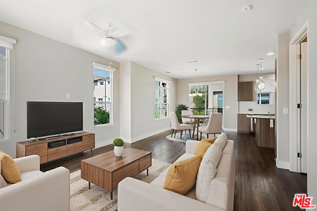 Welcome home to this stunning 2 story luxury townhome at the Paxton Calabasas! This lovely "Dalton"model is move in ready! This beautiful 2-bedroom, 2 -bath townhome offers the perfect blend of comfort, style, and convenience across two well designed levels. Whether you are a professional, a student, a small family or anyone in between, this thoughtfully designed floor-plan provides everything you need. Features include two bedrooms on the main level. The primary bedroom features a bright bathroom with two sinks, soaking tub with a separate full shower with an attached patio with beautiful hill views On the main floor, enjoy the contemporary kitchen, equipped with an island, beautiful pendant lights, stainless steel refrigerator, quartz countertops, oversized six burner gas stove top and oven. Also on the main floor, an open dining area and family room that includes 8 foot high sliding glass doors that open fully to access wonderful fresh air on the patio. Step to the bottom level and you will find the full size laundry room that features a smart washer and full size dryer, a generous bonus/ flex space with direct access to the attached tandem 2 car garage. The garage offers a 220 volt charger. Cool off in the community pool, work out in the gym and relax in the clubhouse. Centrally located with close proximity to Malibu, Calabasas Commons, Erewhon, Westlake Promenade, less than an hour to Los Angeles, dining options, market, parks, top rated schools and Pepperdine University. * images with furniture are virtually staged and are of a similar unit. *One month lease concessions offered for 12 month plus lease *Additional move in bonus offered to tenants who sign a year plus lease- call for details *