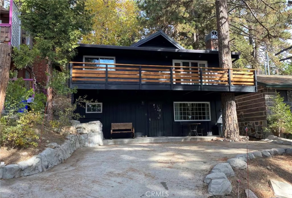 Charming Upgraded Cabin in Running Springs – Fully Furnished!
Welcome to this inviting 2-bedroom, 2-bathroom cabin located in the heart of Running Springs! This mountain getaway has been upgraded throughout and comes fully furnished, making it move-in ready for your next adventure or a turnkey vacation rental.
The spacious primary bedroom is large enough to comfortably fit multiple beds, ideal for hosting family and friends. Downstairs features a massive living room and game area perfect for entertaining, plus a hidden bonus space that can easily serve as a third bedroom or a cozy retreat.
Step outside and enjoy your morning coffee on the peaceful deck surrounded by the beauty of the forest. The cabin is just a short walk to local restaurants, arcades, and charming shops, and only a quick drive to Lake Arrowhead and Big Bear—offering endless year-round activities from summer lake fun to winter snow adventures.
Don't miss your chance to own this stylish, fully furnished mountain escape—this one won’t last long!