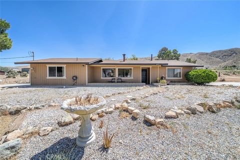 Photo of 22411 Roundup Way, Apple Valley, CA 92308 (MLS # IG26076759)