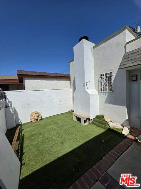 Photo of 611 W 109th Street, Los Angeles, CA 90044 (MLS # 26876459)