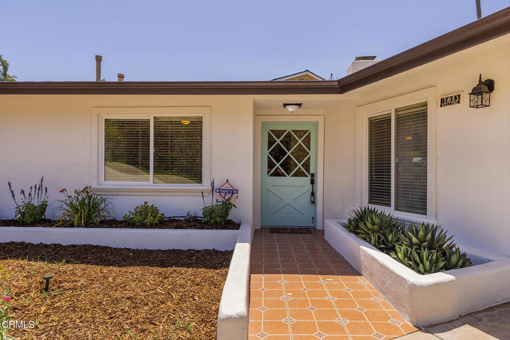 Welcome to this beautifully updated single story four-bedroom, two-bathroom home, nestled in a desirable and well-established Miramonte neighborhood. Featuring a bright and open kitchen, spacious living areas, and tasteful upgrades throughout, this home is move-in ready.Brand new upgrades include luxury vinyl plank flooring, fresh paint inside and out, new fixtures, and low maintenance landscaping. Enjoy the inviting sunroom just off the living room, offering added space to take in views of the expansive park-like backyard. Large backyard oasis complete with a sparkling pool, perfect for entertaining or relaxing under the shade of majestic oak trees. Whether it's summer barbecues or quiet evenings, this yard offers year-round enjoyment in the warm Ojai climate. Additional features include a two-car garage, extra large driveway, interior laundry hookups, and so much more. Enjoy the best of the Ojai lifestyle in this warm, welcoming home.