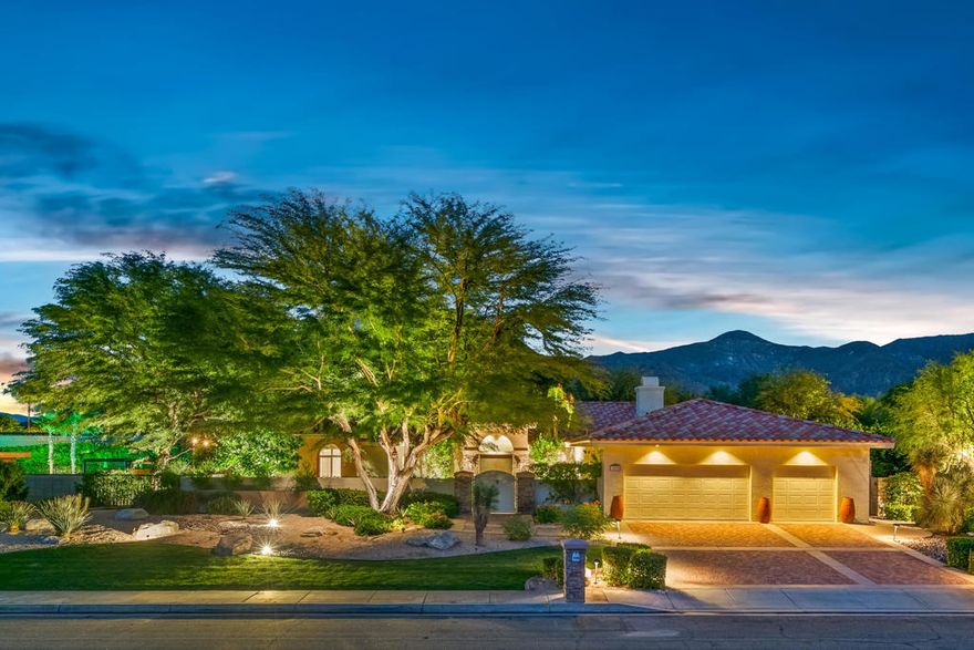 Welcome to 3090 Goldenrod Lane, a timeless 1998 custom-built residence nestled in the coveted Andreas Hills neighborhood. Perfectly situated just down the street from Indian Canyons Country Club, this sprawling 3,400 sq. ft. home offers 4 bedrooms, 3 bathrooms, and soaring ceilings that flood the interiors with light and space. Step into the expansive living room where custom built-in cabinetry, a dramatic double-sided fireplace, and an adjacent custom bar set the stage for everything from lively entertaining to intimate evenings at home. The chef's kitchen is a dream, featuring slab granite countertops, Sub-Zero refrigerator/freezer, and a rolling butcher block workstation--ideal for dinner parties or gourmet meal prep. The adjoining dining area easily accommodates an oversized table, ensuring every guest has a seat at the celebration. The private primary retreat is a sanctuary of its own, boasting two custom walk-in closets worthy of any fashionista and a spa-inspired ensuite with double vanities, soaking tub, and a versatile flex space perfect for a home gym or office. On the opposite wing, three additional bedrooms provide comfort and privacy for family or guests. Outdoor living shines here, with multiple entertainment areas wrapping around the property. Enjoy the sparkling custom saltwater pool and spa with pebble tec finish and a cascading stack-stone waterfall for a serene, resort-like vibe. A built-in grilling station with bar seating and a beautifully landscaped yard, complete with rose garden, elevate the alfresco experience. Upgrades are plentiful: 58 OWNED solar panels with TWO Tesla Powerwalls, EV chargers, a three-car garage, and abundant storage--all combining modern efficiency with luxury living.