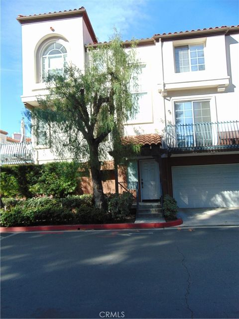 Photo of 12643 TRENT JONES Lane, Tustin, CA 92782 (MLS # OC26016801)