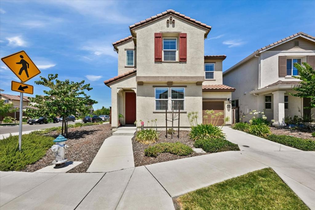 Well maintained Home in the Natomas Field Community, Centrally Located and Within Minutes to Costco Wholesale, I-5, I-80, 99. This 4 Bedrooms 3 Baths offers 2 stories, 1996 living SF, Corner Lot, Central Heating and AC, High Ceilings, Loft can be Computer, Gym or Sitting Area, Windows with Plantation Shutters, Master Bedroom has oversized Walk-in, Master Bathroom has Oval Tub and Stall Shower, Downstairs has one Bedroom and a Full Bath, Granite counter tops in Kitchen and Kitchen Island with Built-in sink. Tankless water Heater, EV Charger in Tandem 2 Car Garage, Living Room has sliding door to Backyard Patio with Customized Concrete Walkway all around, Fully landscaped with fruit bearing trees.