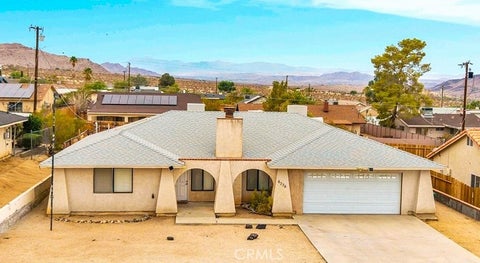 Photo of 6776 Quail Spring AVE, 29 Palms, CA 92277 (MLS # JT26188245)