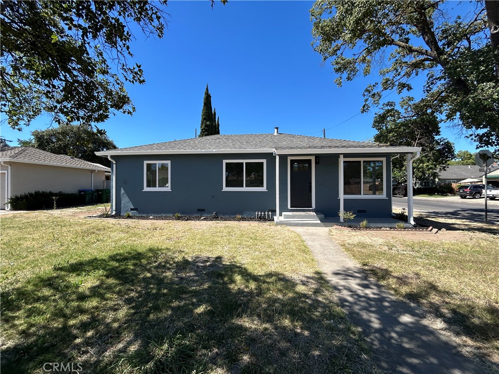 Beautifully Updated Home! This stunning 3-bedroom residence has been thoughtfully renovated with modern touches throughout. Enjoy fresh interior and exterior paint, all-new luxury flooring, and a remodeled kitchen featuring brand-new cabinets, quartz countertops, stylish backsplash, and an upgraded sink and faucet. Modern light fixtures and accent details create a warm and inviting atmosphere. The bathroom boasts a sleek new vanity, beautifully tiled shower, and updated flooring. Bedrooms include updated lighting and new closet doors. Step outside to a spacious backyard, perfect for entertaining or creating your dream outdoor oasis. This home combines comfort, style, and value, don't miss it!