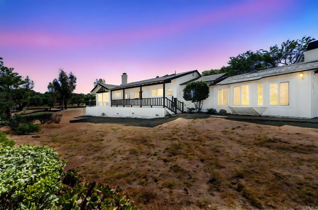 Fallbrook Living at Its Finest! This 3-bedroom, 2.5-bath home features a great floor plan and layout, filled with natural light and highlighted by a beautiful stone fireplace in the family room, a large dining room, and a wet bar—ideal for entertaining. The property also includes a 318 sq. ft. ADU with 1 bedroom and 1 bath, perfect for guests, multi-generational living, or rental income. Step outside and take an energizing dip in the pool or unwind in the spa, all set on 1.15 acres of usable land. For horse enthusiasts, the property offers a well-equipped barn with stalls, a wash bay, and a tack room. Priced to make it your own, this property sits right on the border of Oceanside, offering a coastal climate with a rural feel. Located in the desirable community of Fallbrook, this home combines comfort, functionality, and charm—all within minutes of town amenities and the coast.
