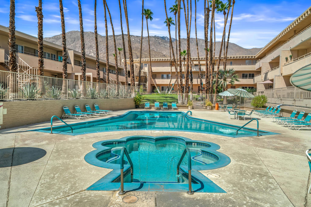 Experience the best of Palm Springs living at Villa Alejo. This stunningly renovated 2-bedroom, 2-bathroom condo is your gateway to a stylish, carefree lifestyle. Imagine waking up to mountain views, then relaxing by the pool or unwinding in the hot tub. Located just a short walk from the best of downtown Palm Springs, you'll be immersed in the city's unique culture. This top-floor unit has been completely upgraded with a new kitchen, bathrooms, flooring, and the convenience of an in-unit washer and dryer. Live a life of ease with community amenities like a gym, community laundry, and reserved parking. Separate storage unit and a secured bicycle storage area is also available and accessible from the community garage. If stairs are a challenge, there is an elevator to conveniently take you from the garage to the second floor. Plus, all utilities are included, leaving you with more time (and money) to enjoy everything Palm Springs has to offer.