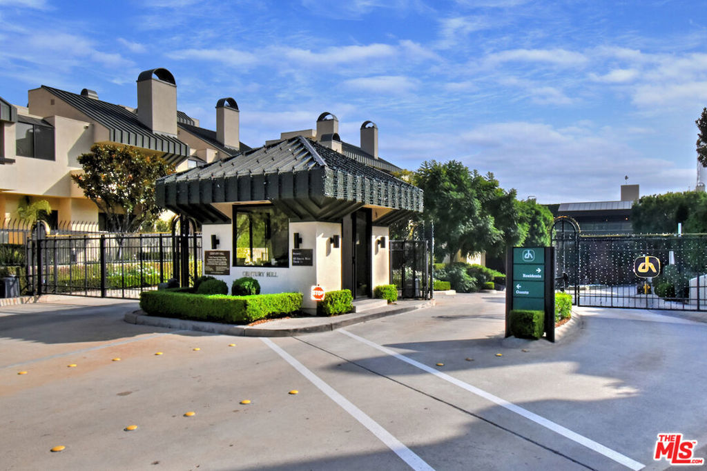 Welcome to 2215 Century Hill, a rare one-level, private, and secure home located in a premier gated community in the heart of Century City. The first thing you notice at Century Hill is the grounds, which set the standard for gated communities across LA with magical gardens, incredible trees, it's a butterfly sanctuary. Inside the unit, high ceilings and an impressive formal living and dining great room offer plenty of space for entertaining family and friends and features a stone-clad fireplace, wet bar, and plantation shutters with sliding glass doors leading to a private, nearly 300-square-foot patio. In the kitchen, there's ample counter space and cabinetry, a breakfast table framed by beautiful picture windows, and an adjacent laundry area that gets the job done. Down the hallway, a powder bath serves your guests, and there are two ensuite bedrooms, including a spacious primary retreat with its own private patio, walk-in closet, and large spa-like bath. This unit is a blank canvas, ready to be remodeled by or for your someone special. And just beyond your doorstep your own swimming pool, fitness center, tennis and pickleball courts, indoor driving range, and racquetball are all part of the luxury lifestyle at Century Hill. The perfect blend of comfort, security, and elegance, with every amenity at your fingertips and everything Century City and Beverly Hills have to offer. Come check out 2215 Century Hill.