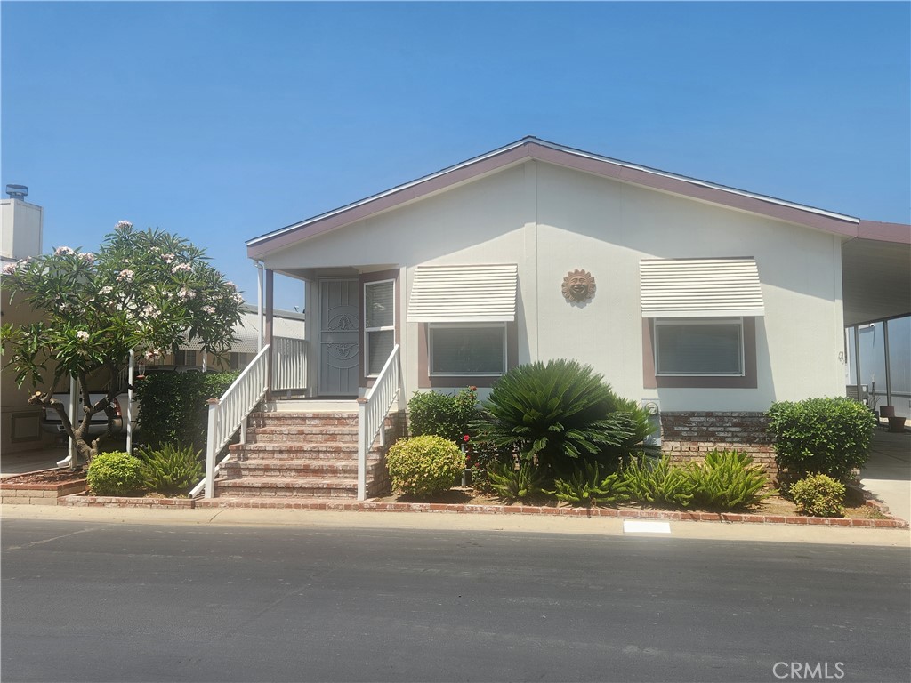 This is a great property in the desirable Cienega Valley Estates. The home has 3 bedrooms and 2 baths; the primary bedroom has a walk in closet and a master bath with walk in shower; the secondary bedrooms share a hallway bath with tub and combo shower. There is an open floor plan and hard surface flooring throughout. There is a lift at the side door in the carport area to make access easier. It is an "all age" park with so many amenities that include a pool and spa, an indoor jacuzzi, saunas, basketball court, gym, game room, library, hair salon, putting green and small park. RV parking is also available. The potential buyer must meet the qualifications and be approved by the Management/Corporate office to reside in the community.