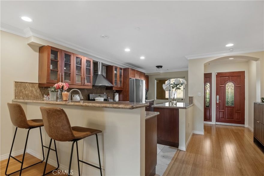 Nestled at the crossroads of South Pasadena and Highland Park, this residence offers an incredible blend of modern amenities and serene living. Step inside to discover an open layout that creates the perfect space for entertaining and cozy evenings near the oversized gas-burning fireplace. The outdoor balcony presents stunning views, perfect for enjoying your morning coffee or unwinding at sunset. This thoughtfully designed layout features two spacious bedrooms, strategically positioned at opposite ends of the hallway for optimal privacy. In between, you’ll find a convenient in-unit laundry area that adds to the ease of daily living. The master suite is a true retreat, boasting a generously-sized custom closet, and a luxurious bathroom complete with a separate spa tub and a dual sink vanity, making it the perfect sanctuary. Parking is easily accessible and includes an EV-Charger and storage unit that add to daily functionality. 
This vibrant community is ideally situated close to all essential amenities, including the charming streets of South Pasadena, USC, CSULA, and the bustling Downtown Los Angeles, ensuring that you are never far from work or leisure. With breathtaking views and a prime location, this property is not just a home; it’s a lifestyle.