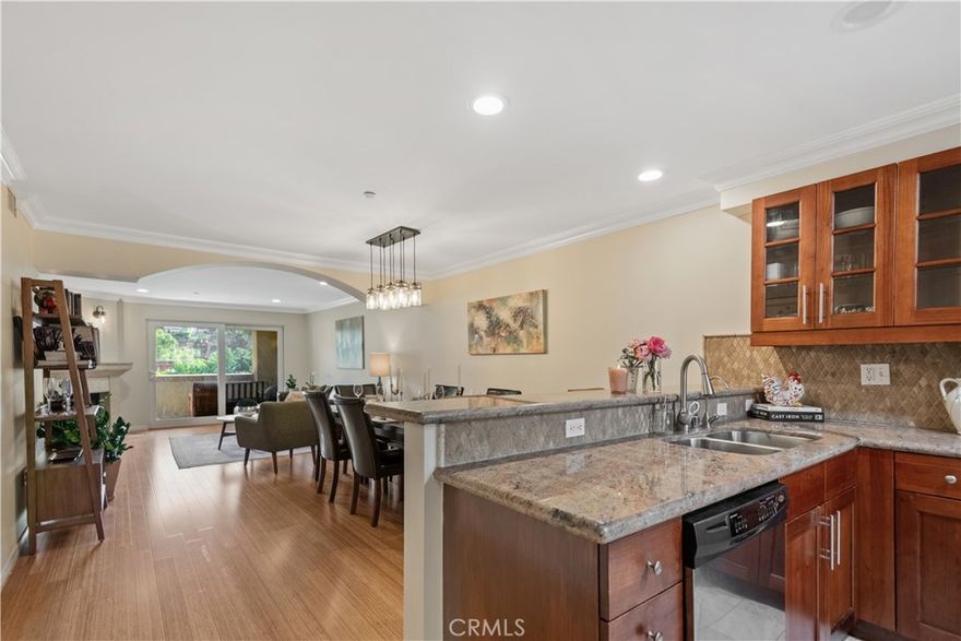 Nestled at the crossroads of South Pasadena and Highland Park, this charming residence offers an incredible blend of modern amenities and serene living. Step inside to discover an open layout that creates the perfect space for entertaining and cozy evenings near the oversized gas-burning fireplace. The outdoor balcony presents stunning views, perfect for enjoying your morning coffee or unwinding at sunset. This thoughtfully designed layout features two spacious bedrooms, strategically positioned at opposite ends of the hallway for optimal privacy. In between, you’ll find a convenient in-unit laundry area that adds to the ease of daily living. The master suite is a true retreat, boasting a generously-sized custom closet, a private balcony for your exclusive enjoyment, and a luxurious bathroom complete with a separate spa tub and a dual sink vanity, making it the perfect sanctuary. Parking is easily accessible and includes an EV-Charger and storage unit that add to daily functionality. 

This vibrant community is ideally situated close to all essential amenities, including the charming streets of South Pasadena, USC, CSULA, and the bustling Downtown Los Angeles, ensuring that you are never far from work or leisure. With breathtaking views and a prime location, this property is not just a home; it’s a lifestyle.
