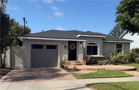 Photo of 2019 Charlemagne Avenue, Long Beach, CA 90815 (MLS # PW26200212)