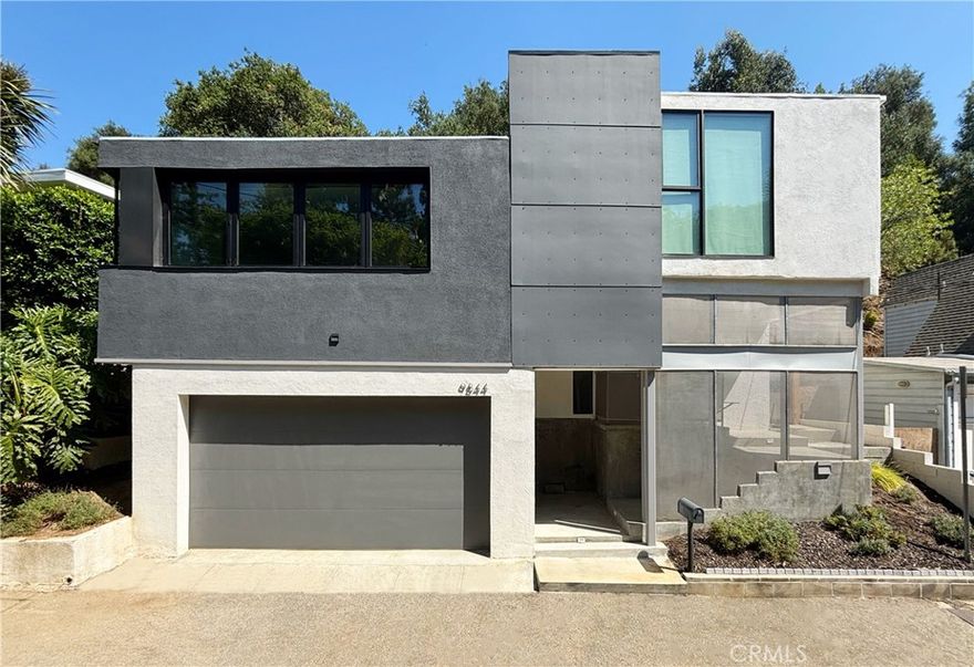 HUGE PRICE IMPROVEMENT!! 

Experience the elegance of 9844 Wanda Park, a fully reimagined designer residence nestled in the sought-after Beverly Hills Post Office area.



Situated in the legendary 90210 zip code, this residence blends the sophistication of European craftsmanship with the relaxed sensibility of California living. Thoughtfully arranged across three refined levels, the home offers 2,342 square feet of living space on a generous 10,663-square-foot lot, creating an ideal balance of luxury and comfort.



From the moment you enter, you are welcomed by curated design details that set this home apart: Carrara White Marble countertops, Montclair Danby Marble sinks, and a chef’s kitchen outfitted with Smeg and Bertazzoni appliances. Elevated by a built-in coffee station, wine fridge, and sleek microwave, the kitchen flows seamlessly into the open living areas—perfect for entertaining or intimate gatherings.



The primary suite serves as a private retreat, featuring a spa-inspired bath wrapped in European Habana Marble and enhanced with a TOTO smart toilet. Three additional bedrooms provide ample versatility, whether for family, guests, or a dedicated office. Throughout the home, smart-home technology integrates modern convenience with timeless style.



Outdoor living is equally impressive, with a spacious dining patio off the kitchen, a serene upper-level seating area with canyon views, and a two-car garage with enclosed storage.



Located just moments from world-class shopping and dining on Rodeo Drive, this residence represents a rare opportunity to own a turnkey designer home in one of Los Angeles’ most exclusive neighborhoods.