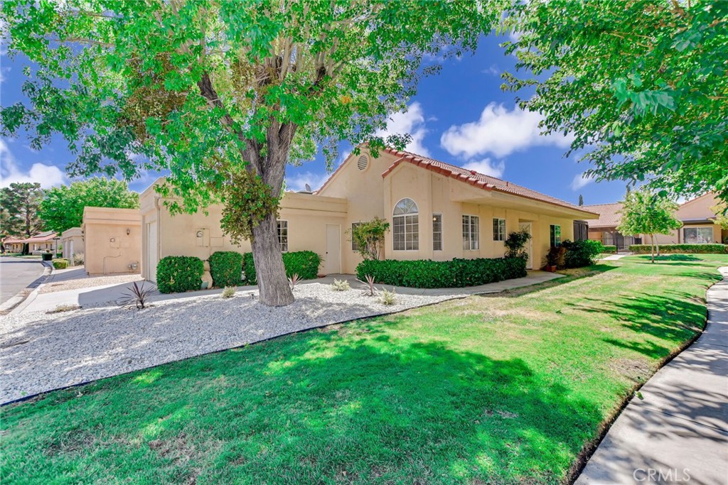 Welcome to Jess Ranch!
Discover this charming home in one of Apple Valley’s most desirable 55+ communities, where convenience and comfort come together. Just steps from shops, grocery stores, a movie theater, golf, and miles of walking and biking trails, you’ll enjoy easy access to everything you need for a fulfilling lifestyle.
Inside, this move-in ready home offers thoughtful design and plenty of storage—perfect for anyone looking to downsize without compromise. Both bedrooms feature spacious walk-in closets, while the living areas provide two additional large closets for extra organization. This home would also be a great income property.
The primary suite is generously sized and includes a private ensuite bath with dual sinks. The guest bedroom is warm and inviting, with direct access to the guest bath, complete with a tub/shower combo and convenient laundry room. The kitchen is bright and versatile, with space for a dining table and views of the beautifully landscaped neighborhood. The front yard just had a make over to include low maintenance landscaping.
Living at Jess Ranch means more than just a home—it’s a lifestyle. Enjoy the resort-style amenities including a clubhouse, swimming pool, hot tub, guarded gated security, shaded walking and biking paths, lush greenbelts, and mature trees that create a park-like setting.
Don’t miss the chance to make this Jess Ranch gem your next home!