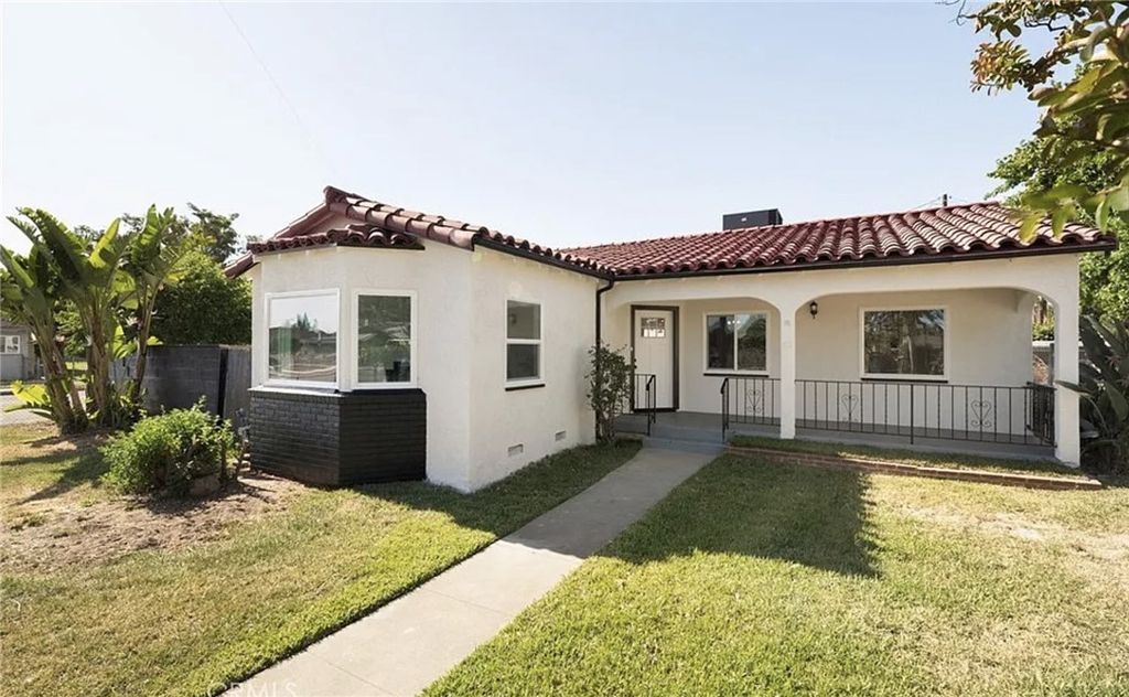 Photo of 709 E E 9th St St, Pomona, CA 91766 (MLS # IV25244722)