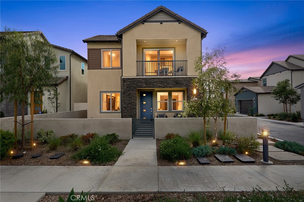 PREMIUM CORNER LOT LOCATION TWO-STORY HOME WITH GREENBELT + HILLSIDE VIEWS JUST STEPS TO PORTOLA HIGH, SOLIS PARK K-8, SOLIS POOLS, THE RETREAT, & SOLIS PARK CLUBHOUSE! Discover modern elegance in the vibrant Solis Park community of Irvine’s Great Park Neighborhoods. This two-story home blends open concept living with private retreats, perfect for families and entertainers. Our Premier “Skylark” Collection Residence THREE at Solis Park was built by Lennar and is a CORNER Lot Premium with NO HOMES DIRECTLY IN FRONT! This FULLY LOADED Contemporary Retreat offers 4BD (one main level) 4BA (one main level), a Loft, Private Deck, and approximately 2,591 Sq. Ft of Decadent Interior Living Space! The home features NEW Luxury Vinyl Plank Flooring, LED Recessed Lighting, Custom Fitted Window Curtains, Shaker Door Cabinets, Solar Panels, and ATTACHED 2-CAR Garage! Chef-Inspired Gourmet Kitchen with Quartz Countertops, Backsplash, Expansive Kitchen Island, White Shaker Door Cabinetry, and ALL Stainless-Steel Appliances (including Built-In Refrigerator)! Private & Quaint Side Yard with Artificial Turf & Private Front Patio. Enjoy world-class amenities exclusive to Great Park residents -- 5 parks, 3 full court basketball courts, tennis courts (25 courts + championship court) 2 junior Olympic pools, 4 spas, 3 club rooms, BBQ picnic destinations at every park and one greenhouse. Award-winning Irvine unified school district (zoned Portola High School & Solis K-8) and just minutes from dining destinations at the Woodbury Shopping Center, Five Points Amphitheater Irvine Spectrum, John Wayne Airport, Kaiser Permanente, and nearby connecting freeways ( I-5, 405, 241, 133, & 73)!