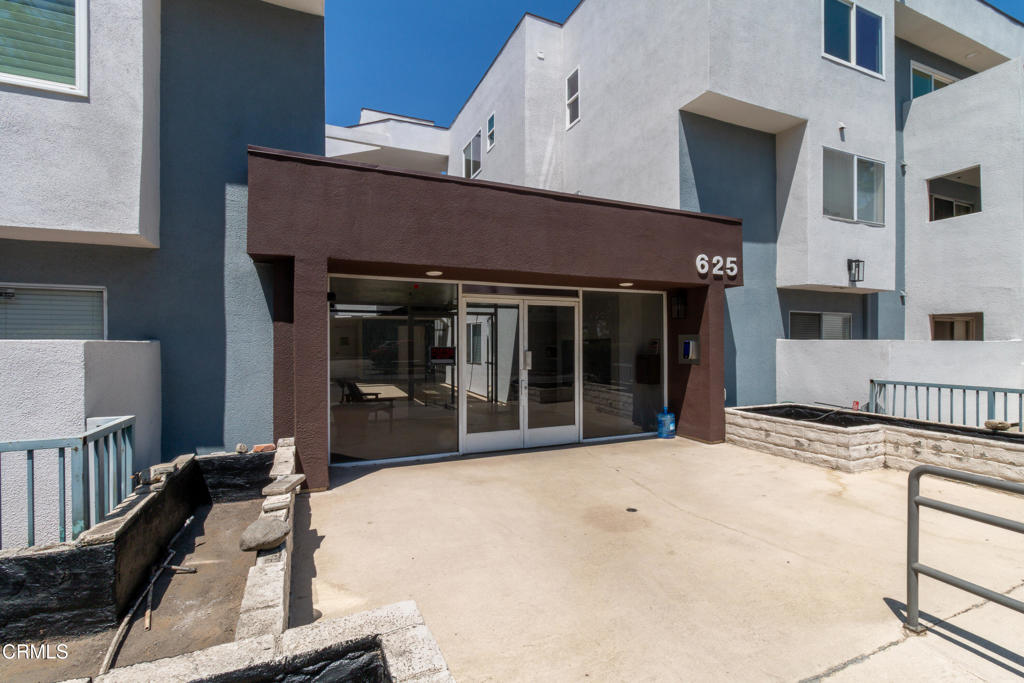 Located in a secure, gated building just moments from The Shops on Lake Avenue, Old Town Pasadena & the historic Pasadena Civic Auditorium, this beautifully updated top-floor unit offers modern living in one of the city's most desirable neighborhoods. Featuring wood-like laminate flooring throughout, this 2-bedroom, 2-bath condo boasts an open-concept layout ideal for both comfort & entertaining. The updated kitchen includes quartz countertops, a large eat-up island with chic pendant lighting, stainless steel appliances, a 5-burner gas stove with a convection oven & recessed lighting. The kitchen flows into the spacious living room, where you'll find additional recessed lighting, a cozy gas fireplace & a sliding glass door that opens to a private balcony. Down the hallway, the first bedroom offers a generous closet, ceiling fan/light system & direct access to a full bathroom with a stone-topped vanity, also accessible from the hallway for guests. A side-by-side washer & dryer are conveniently located nearby. The spacious primary suite features mirrored closet doors with built-ins, a ceiling fan/light system & an ensuite bathroom with tile flooring, two separate single-sink vanities, stone countertops, recessed lighting & a full tub/shower combo. Additional highlights include two side-by-side subterranean parking spaces, a secure building with controlled access, central air conditioning & heating. This move-in-ready condo combines space, style & an unbeatable location.