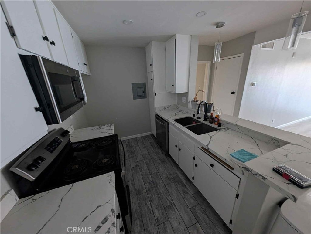 Photo of 5460 White Oak Avenue #302 Ave, Encino, CA 91316 (MLS # SR25215564)