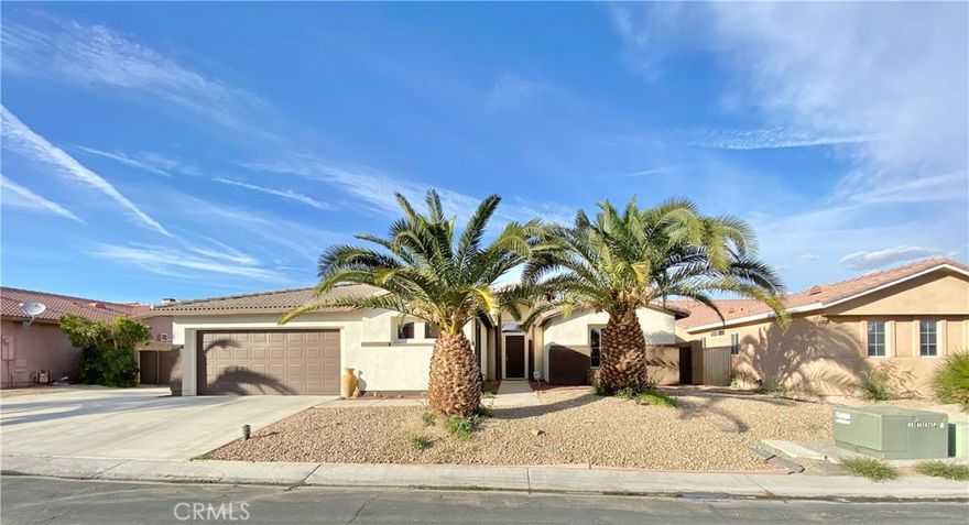 Welcome to this beautiful, move-in-ready home located in a highly sought-after gated community in Indio. Featuring an expansive open floor plan, this spacious 4-bedroom, 3-bathroom home offers the perfect blend of comfort, style, and functionality. Each of the four generously sized bedrooms offers ample closet space. Step outside to your private oasis—a sparkling pool, perfect for relaxing or hosting friends and family. The large backyard provides plenty of room for activities, with direct access for RV or trailer parking, making this home ideal for outdoor enthusiasts. Located in a quiet and desirable community, you'll enjoy the peace of mind that comes with a gated neighborhood, while still being close to all the best that Indio has to offer—local parks, schools, shopping, and dining. Don’t miss your chance to make this dream home yours. Schedule a showing today!