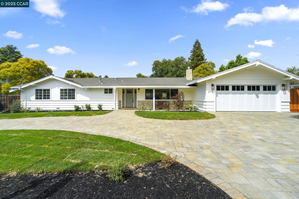 Welcome to your Dream Home in the Heart of St Francis!! This stunning single-story Ranch style-home sits on a spacious 1/4-acre flat lot in one of the most sought-after neighborhoods in the area. Fully turnkey and thoughtfully renovated, this home features a light-filled open floor plan with high-end finishes throughout!! The designer kitchen has been completely remodeled with top-of-the-line appliances, modern cabinetry, and elegant finishes perfect for entertaining or daily living. Enjoy new flooring throughout, fully updated bathrooms with custom tile work, and recessed lighting that enhances the home's natural brightness. Cozy up to the elegant natural stone fireplace with a gas insert or step outside to your beautifully landscaped backyard-featuring new cement work ideal for gatherings, summer relaxation, or your own outdoor retreat. Additional highlights include: All new pavered circular driveway, abundant natural light from large windows!! Prime Location near Cowell Park, top-rated schools and local amenities. This home is truly a rare gem in a fantastic community. Too many upgrades to list-come see it in person to truly appreciate all that it has to offer!!!