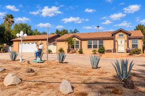 Photo of 25340 Charina LN, Homeland, CA 92548 (MLS # SR26202628)