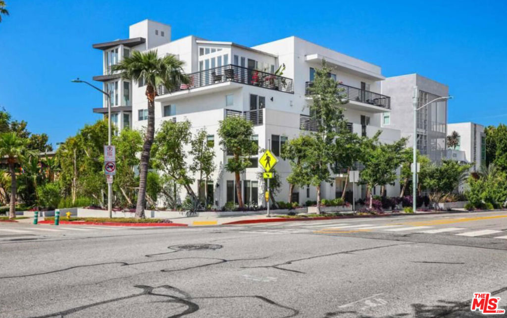 Experience modern luxury living in the heart of West Hollywood. This stunning two-story townhouse is located in a premier building originally constructed as a condominium, offering superior quality and design throughout. Enjoy direct street access as well as private entry from the secured, gated parking area. Spanning approximately 1,910 square feet, the residence features two spacious primary suites with walk-in closets, two and a half well-appointed bathrooms, soaring ceilings, and recessed lighting. The sleek chef's kitchen boasts premium Bosch stainless steel appliances and generous counter space perfect for both everyday living and entertaining. Additional highlights includes an in-unit washer and dryer, a private balcony, and a dedicated private storage room. The building also offers a rooftop deck with sweeping 360-degree views of the city and mountains. Ideally situated just moments from Sunset Boulevard and some of West Hollywood's best restaurants, boutiques, and nightlife.