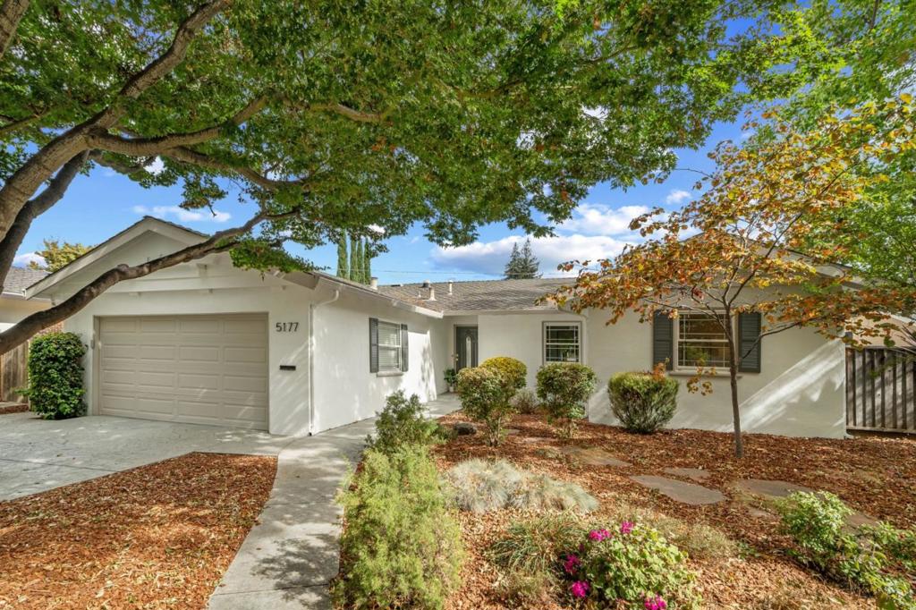Welcome to 5177 Englewood Dr in sought after Happy Valley neighborhood, a move-in ready single-level home featuring 4 bedrooms and 2 bathrooms. The recently updated kitchen shines with quartz countertops and brand-new stainless steel appliances - perfect for cooking and entertaining. Refinished hardwood floors flow throughout, complementing a spacious living room with a cozy fireplace and a stylishly renovated hall bath. Additional highlights include central heating and air conditioning, a convenient laundry area with washer and dryer, and an attached two-car garage. The private backyard provides generous space for outdoor living, gardening, or future expansion. Set within the Moreland Elementary School District, and close to shopping, dining, parks, and major tech employers, this home offers comfort, convenience, and lasting value in one of San Jose's most desirable neighborhoods.