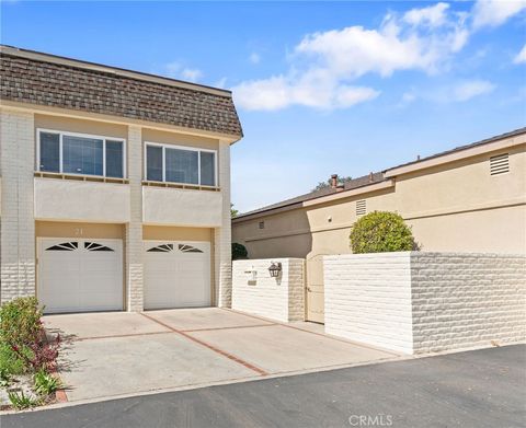 Photo of 21 Queens Wreath Way, Irvine, CA 92612 (MLS # OC26032696)