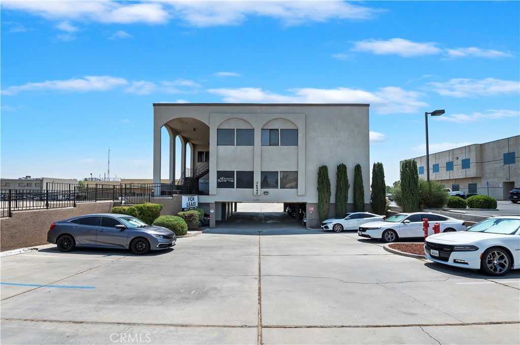 FOR LEASE! Lease for 1 year with the option to renew. Two units are available—Unit A, 2,225 sq ft, and Unit B, 1,020 sq ft of professional office space. The basic lease is in effect, and the only other fee will be the electricity bill. Within walking distance of the Victorville courthouse. Excellent space for accounting firms, lawyers, Realtors, or bondsmen. Second floor, no elevators. Both units have private entrances. A shared kitchen is available, and each unit is equipped with a private restroom. Can also lease the two units if you need that much space. The smaller office features a conference room, cubicles, a library space, and storage areas. The unit, which is 2,225 square feet, features a conference room, a reception area, and an abundance of cubicles. Must see this opportunity! Additionally, there are three assigned parking spaces located under the building. There is plenty of available parking in the lot. Please call to set up a viewing soon. Inquire about the availability of the downstairs office in August.