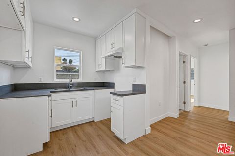 Photo of 220 E Vernon Avenue #1/4, Los Angeles, CA 90011 (MLS # 26658941)