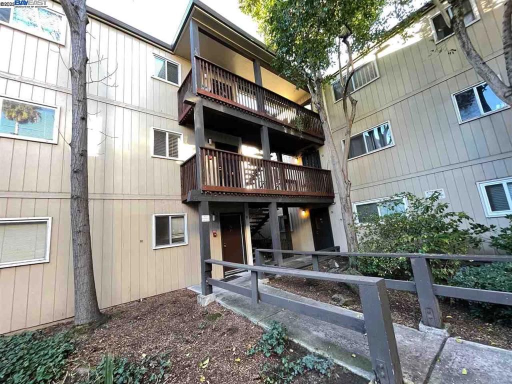 Concord 2 bedroom 1 bath condo Located on the second floor for rent. Close to shops. One assigned covered parking space. Community pool, picnic area with BBQs and basketball court. Rent included HOA fees which included water and trash. No Pet and No smoking.
