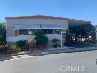 Beautiful 2 Bed 2 Bath home in a great senior community in Riverside! This home has 1248 square feet with a large living area, large bedrooms and large bathrooms! It features a nice sized dining room with built ins and still has enough room for an eat in kitchen!! The carport features an extended awning for your full sized vehicles. The large yard boasts a large covered patio, beautiful fruit trees and is very nicely landscaped! With all this space, an indoor laundry room and central air & heat, you will never want to leave! You must see this beauty!!