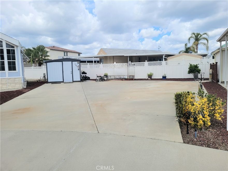 Welcome to your private oasis at Mountain Shadows RV Resort offering unmatched resort-style living in the heart of Southern California. Come see this HUGE lot with utilities at the site. OWN YOUR OWN Premium sized "A" LOT! Here is your RARE opportunity to own one of the larger improved pie-shaped lots in the Mountain Shadows 55+ resort community. Conveniently located only 2 lots down from the 2nd clubhouse---with jacuzzi, laundry and workout room. Roll right onto this fully paved level lot. This spacious land is flat and very usable with water and sewer connected. The Shed is oversized and afforded with full sized refrigerator and water. Steps from this spacious lot, the fantastic 55+ community features state of the art amenities including pool, spa, club house, many events for the active lifestyle: Community dinners, dances, and Saturday Breakfast. There is so much to do in this gated and secure community. You will enjoy Low taxes and HOA. HOA is $293/month and covers water, sewer, trash, basic cable and internet. This scenic oasis awaits you.  ***FINANCING AVAILABLE***