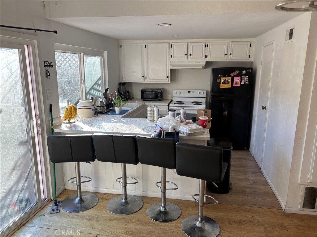 Photo of 9753 Karmont AVE, South Gate, CA 90280 (MLS # MB26197131)
