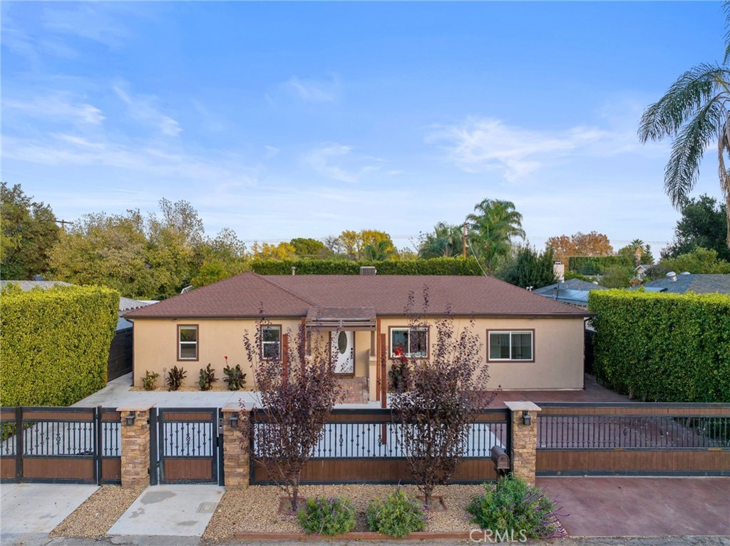 2436 sqft of structure with a LOT Size of 9480 sqft. Multi-Unit Property. Total 6 Bedrooms and 4 Baths. Main House is 4 Bedrooms, 2 Baths 1574 sqft and the ADU is 2 Bedrooms, 2 Baths 862 sqft. Live at your Oasis or Rent it out with a Potential Rental income of $9000/Month. Main House was renovated in 2022. Open floor plan, Wood flooring, Central AC and Heating. Washer and Dryer inside the unit. Refrigerator included. Tankless water heater. Paid off Solar panels installed in 2016. The ADU has a separate address, 8448 Calvin Ave. Built in 2021. ADU has a private entrance and a separate backyard. ADU has a Washer and Dryer inside the Unit. Tankless water heater, Double pane windows. Partial high Ceilings. ADU is currently leased for $2875 and it’s month to month. To Capitalize on rental income, the Main house has been temporarily sectioned off to a 3rd separate unit known as the Private Suite. This unit is 2 Bedrooms and 1 Bath with its own Private Entrance and backyard. The Private Suite is currently leased for $2540 and it’s month to month as well. The Remainder of the main house could be Leased for $3500, for a Potential total Rental income of $9000/Month. This property is Perfect for you to Occupy with your Large Family or Rent it out as an Investment. There is so much more room in the back to add an additional ADU or a SB 9 unit. Prime Location near CSUN, Costco, Porto's Bakery, Northridge Mall, Parks, In-N-Out and much more. U-Shaped Gated driveway with 2 automated Doors. Make this a Perfect place to call Home. You will LOVE this place.