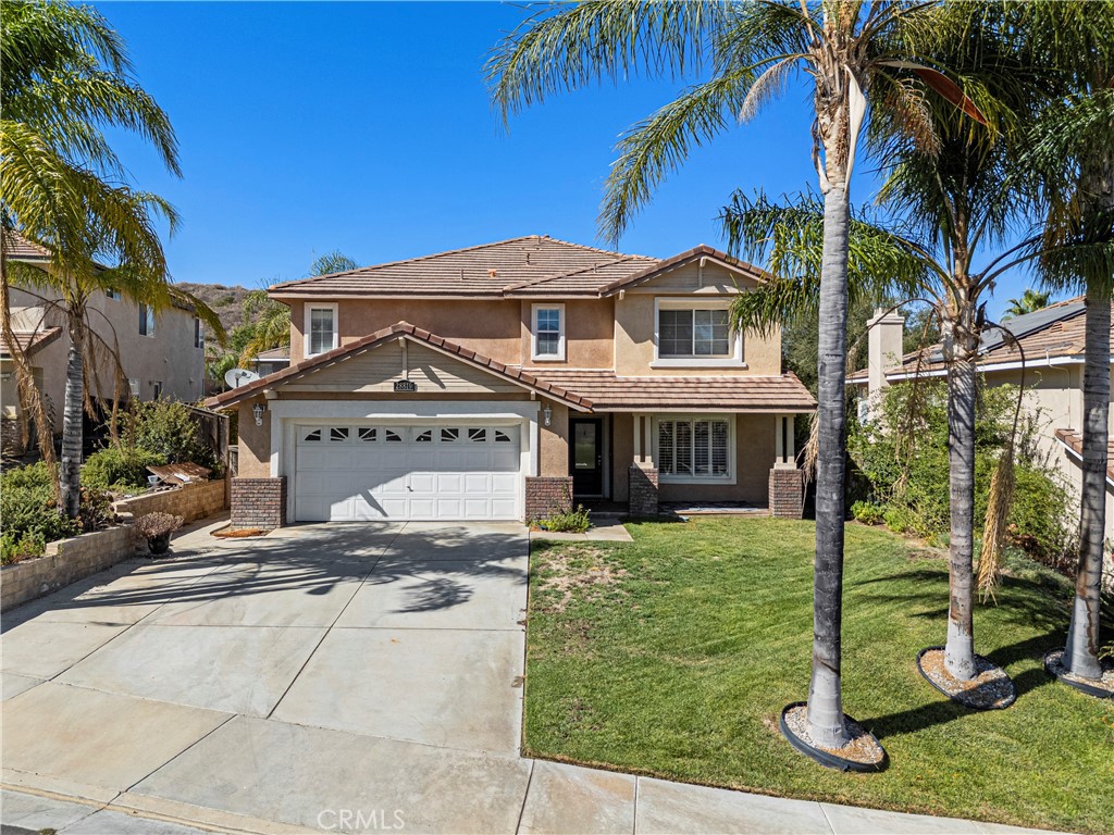 Beautifully Updated Entertainer’s Home in Quiet Cul-de-Sac! Welcome to this spacious and inviting 3,000+ SQFT home, ideally situated in a peaceful cul-de-sac and designed with both comfort and entertaining in mind. Step inside to discover a formal living room and dining area, complemented by a generous family room featuring a cozy fireplace—perfect for gathering with loved ones. The heart of the home is the fully remodeled kitchen, a dream for any home chef. A stunning granite center island, sleek quartz countertops, and abundant cabinet space. The kitchen also includes a walk-in chef’s pantry and a sunny breakfast nook with lovely views of the backyard. Downstairs, you’ll also find new, stylish vinyl flooring that adds a modern touch and durability throughout the main living areas. Upstairs, retreat to the expansive primary suite with a large walk-in closet and an ensuite bath featuring dual sinks, a soaking tub, and a separate shower. Three additional spacious guest bedrooms, a full bathroom, and a versatile loft—ideal for a home office, library, playroom, or media space—complete the upper level. Additional highlights include a downstairs laundry room, a guest powder room, plantation shutters and wood blinds throughout, and a 3-car tandem garage offering plenty of storage!