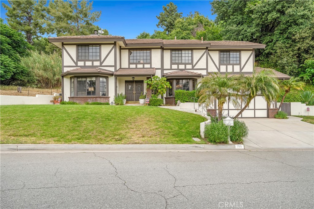 First time ever on the market! The original owners have beautifully maintained this 4-bedroom, 2.5-bath residence which offers the perfect blend of comfort, space, privacy and style. Nestled in a quiet and family-friendly neighborhood, this home features an open-concept layout ideal for both everyday living and entertaining. Step inside to find a spacious living area filled with natural light and a large sized kitchen with a center island complete with stainless steel appliances and granite countertops. A cozy dining area opens onto a private outdoor space making it perfect for summer barbecues and peaceful evenings. The primary suite offers a walk-in closet, soaking bathtub, and en-suite bath with double vanity. Three additional bedrooms provide ample space for family, guests, or a home office. Additional highlights include a two-car garage with two levels of storage and a laundry area upstairs with plenty of storage. This delightful property is located in a highly desirable area of North Monrovia within the award winning Bradoaks Elementary school district. Come take a tour of this serene atmosphere today.