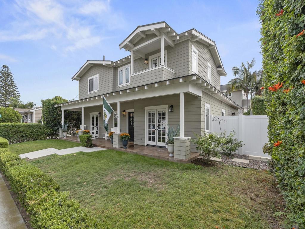 Coronado is more than just a paradise across the bay. It’s a lifestyle and a feeling of belonging that has spanned across many generations. When you mix in this beautiful newer construction home that checks off almost all the desires that one could have for complete living, you score the ultimate winning combination. Introducing a stunning residence featuring exceptional curb appeal, a wonderful lazy front porch spanning the entire home, and a contemporary 5 bedroom floorplan design that accentuates the healthy outdoor living experience Coronado is known for. The residence is located in the heart of Coronado’s bayside experience, with short strolls to a huge array of restaurants, grocery and boutique shopping, as well as a wide variety of recreational activities. You want to experience something special? Take a morning walk along the bay and enjoy watching the sun rise while gazing at arguably one of the most dramatic downtown city views in the entire country, if not the world. *See Supplement for Details.* All the boxes get checked off with this house… We’ve already talked about the bayside beauty and convenience, but that is only the start. The home was built on an ideal lot with excellent dimensions that doesn’t squeeze you into one of those narrow house designs. The experience is spacious and allows for a multitude of options. Step inside and you’ll love the site lines with a big open concept great room space encompassing all the living areas and kitchen, with a wonderful transition to the beautiful backyard. The kitchen is a standalone beauty featuring Viking and Samsung appliances plus a ton of counter space, which includes an island with a nice breakfast bar set up. The high ceilings in this part of the home creates an openness, accented by wonderful French doors that open up seamlessly to the outdoors. The backyard has been created around a grand outdoor living room, framed by a dramatic outdoor fireplace centerpiece, and lined by a peach and lime tree. Perhaps practicing your putting will be in order, since this comes with a playful golf putting green! There’s plenty of room for kids, pets, friends and family gatherings. This is truly a dream backyard and not some shrunk down patio that is being portrayed as a backyard! Coming home from a run on the bay, golf course or beach? Never fret as an outdoor shower awaits you for a cool and refreshing rinse off. The home features multiple en-suite bedroom set-ups, both upstairs and down. Upstairs you’ll find a couple of generous sized bedrooms adjoining a stylish modern hall bath. Across the other side, step into a dream primary suite drenched in light, featuring a private balcony, a cozy sitting area, and a primary bath complete with standalone soaking tub and grand walk-in shower. There are dual, but separated, vanities as well as a perfect sized wardrobe with plenty of room to share. The downstairs features two large bedroom suites. One of them currently functions as a family room retreat, complete with a mini kitchenette. It is perfect for extended family or even an ADU-style rental, as it has a direct access entrance to the street. The other large en-suite doubles perfectly as a home office, and also boasts direct access to the front of the home. The entire home has rich wood flooring in living areas and hallways, contemporary can and sconced lighting, two HVAC systems and ceiling fans. There is a laundry room with side by side machines. This opens directly into the large 2-car garage, which is upgraded with epoxy flooring, built-in cabinets, racks and a workspace. Add to this a fully owned solar system, ADT Security System, tankless water heater and a huge bonus for anywhere in Coronado: two extra off-street parking spaces behind the garage. Coronado’s bayside living community is truly one of the best lifestyles in all of San Diego. Whether you want to watch some all-star little leaguers at Bradley Field, or cheer on some softball and soccer matches at Tidelands Pa...