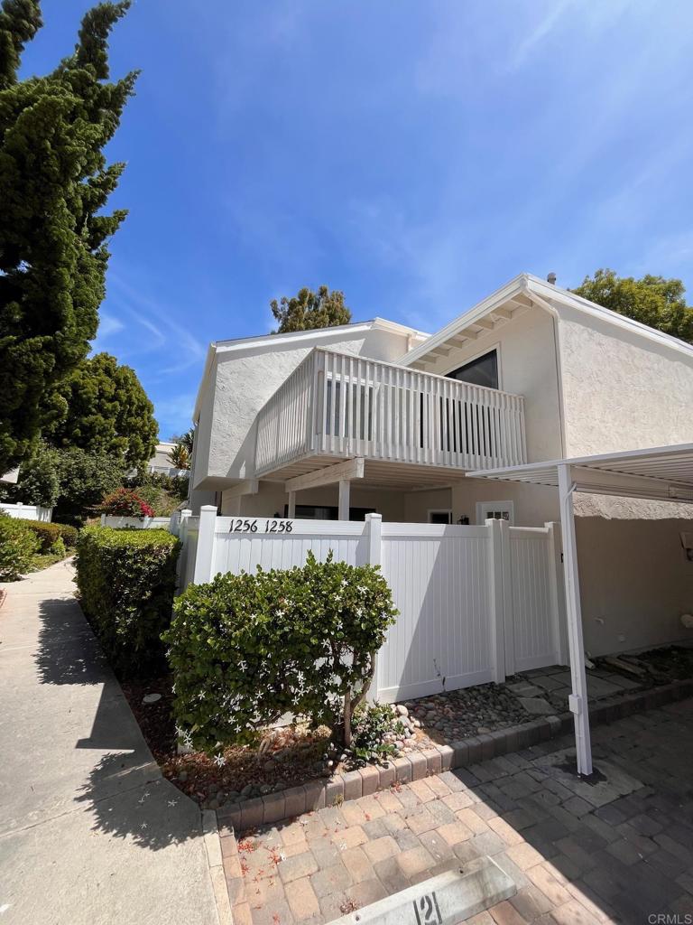 Welcome to 1258 Evergreen Drive, an exceptional opportunity to experience the quintessential Cardiff lifestyle within the highly sought-after Planned Unit Development of Park Place Bluffs. Step inside this bright 2 story condo with 3-bedrooms, 1 1/2-bathrooms and 1258 square feet of living space, where an open, airy layout provides the perfect backdrop for daily living and entertaining. Imagine crafting culinary delights in the well-appointed upgraded kitchen, or unwinding in living spaces, also recently upgraded and designed for comfort and ease. The private enclosed patio sanctuary offers a serene escape, ideal for morning coffee. Or step out onto the main bedroom balcony for an evening gatherings under the stars. With 2 dedicated car port spaces right next to the home, your coastal adventures begin and end with effortless parking. 675 Credit Score or Better No Evictions No Judgments No Open Bankruptcies 2.5 Times the Rent in Gross Income Good Landlord References' Pet policy: No Pets Liability Insurance Required