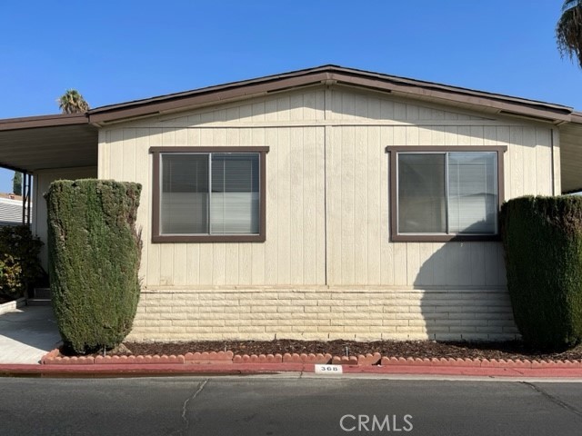 Beautiful 2-bedroom 2 bath mobile home located in the exclusive Rancho Ontario. This home offers a big square footage layout; this home has a family room and a living room. This home has an enclosed porch and also offers a shed. Renovated amenities await you offering a heated pool and spa opened year-round, a hall to host any event, our clubhouse offers a billiards room, card table room, a fitness room as well as a gym or lounge area to just sit and relax. The Park also offers an active area with two pickleball courts, bocce ball and we didn't forget about your fur babies, two dog parks. Don't miss out on touring and calling it home.