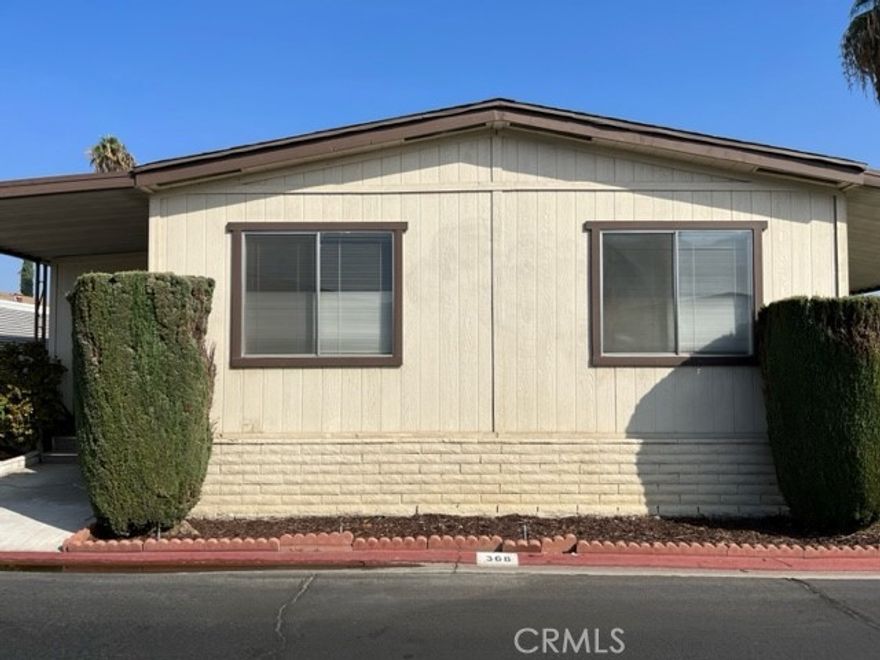 Beautiful 2-bedroom 2 bath mobile home located in the exclusive Rancho Ontario. This home offers a big square footage layout; this home has a family room and a living room.  This home has an enclosed porch and also offers a shed. Renovated amenities await you offering a heated pool and spa opened year-round, a hall to host any event, our clubhouse offers a billiards room, card table room, a fitness room as well as a gym or lounge area to just sit and relax. The Park also offers an active area with two pickleball courts, bocce ball and we didn't forget about your fur babies, two dog parks. Don't miss out on touring and calling it home.