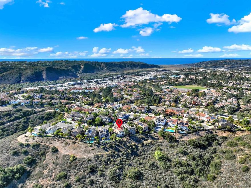 Enjoy breathtaking panoramic canyon views from this beautifully updated home. Featuring hardwood floors throughout, a remodeled kitchen with stylish finishes, and a family-size yard, this home is designed for both comfort and entertaining. The primary suite offers a private balcony overlooking expansive canyon views, creating a peaceful retreat to start and end your day. A perfect blend of elegance, warmth, and natural beauty.