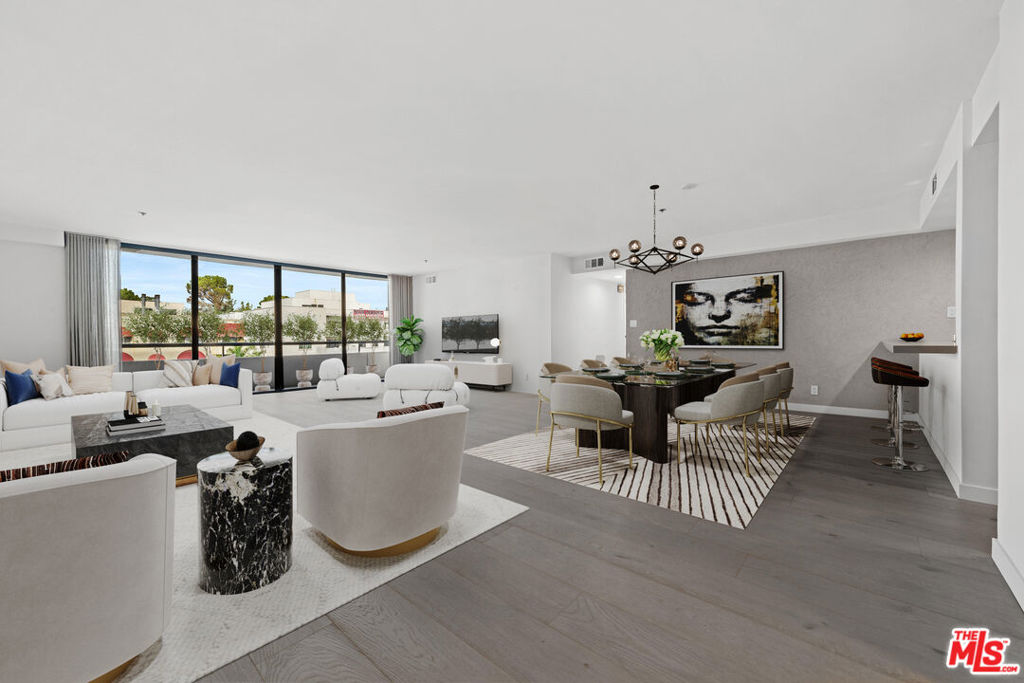 Extensively remodeled and beautifully designed, this Wilshire Corridor condo blends modern sophistication with everyday comfort. Wide-plank European oak floors bring warmth and character, while the open-concept kitchen impresses with a quartz island, sleek gray Venetian plaster walls, and integrated stainless-steel appliances. The primary bath features a European-style roll-in shower for a luxurious touch. Full-service amenities include 24-hour valet, concierge, a heated pool, gym, and social room. Photos were taken prior to current tenancy and are virtually staged. Tenant-occupied through 9/1/2025. This contemporary retreat is ideally located near theaters, restaurants, Westwood Village, and UCLA.